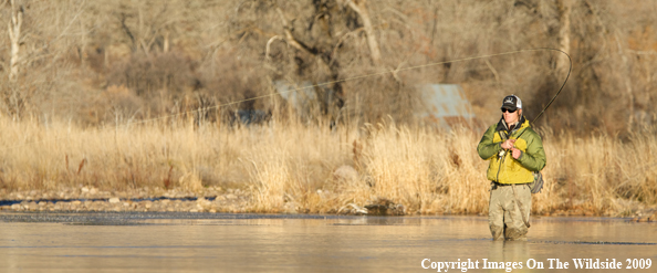 Flyfisherman on river.