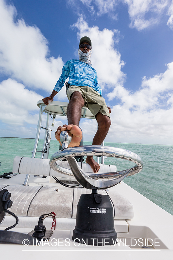 Flyfisherman on boat.