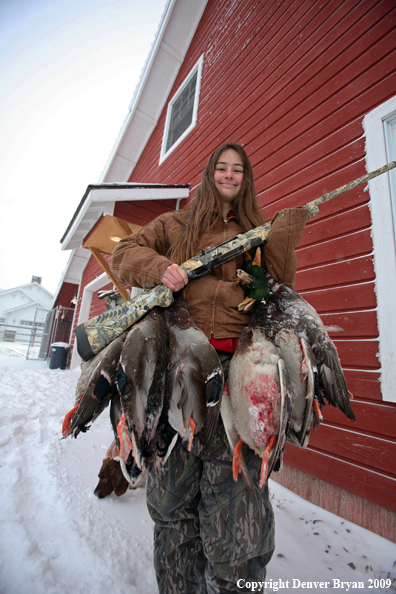 Young Hunter with Ducks