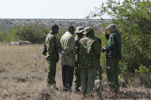 Wildlife Biologist in field with black rhino