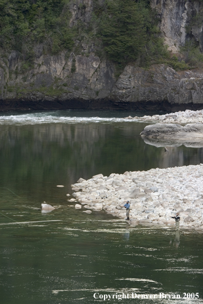 Flyfishermen casting from shore.