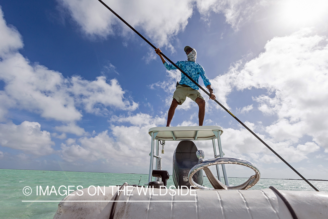 Flyfisherman on boat.