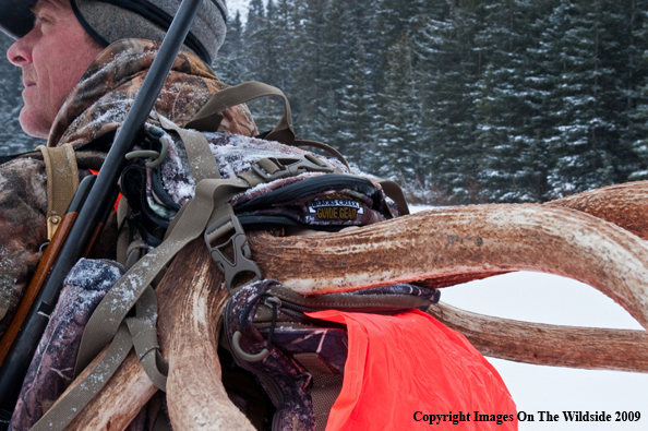 Hunter with elk rack