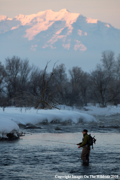 Flyfisherman on stream.