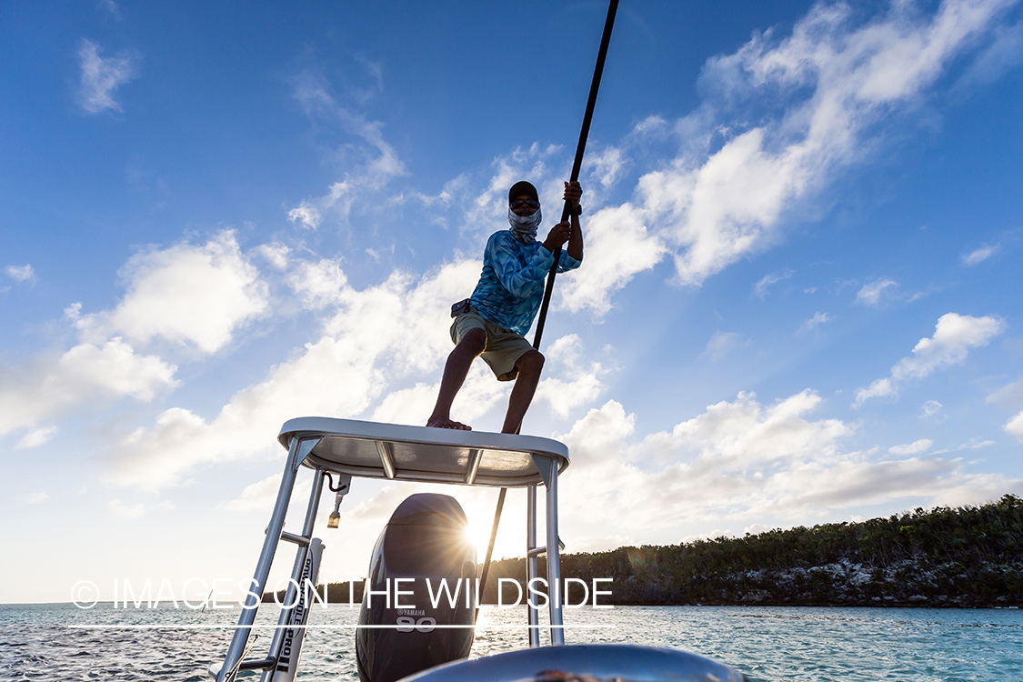 Flyfisherman on boat.