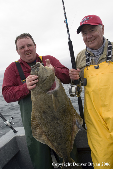 Fishermen with halibut catch.  (Alaska/Canada)