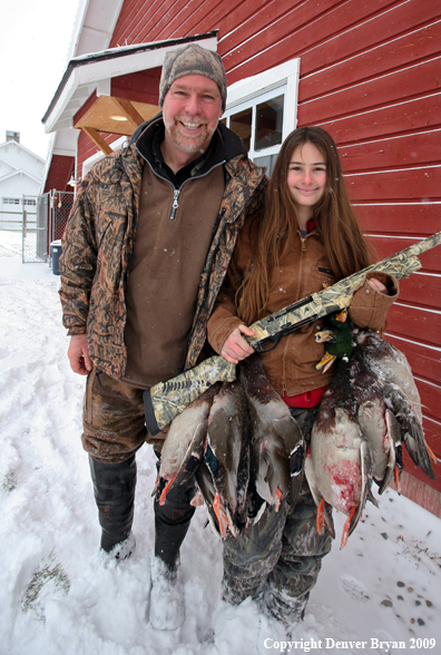 Father and Daughter with Ducks