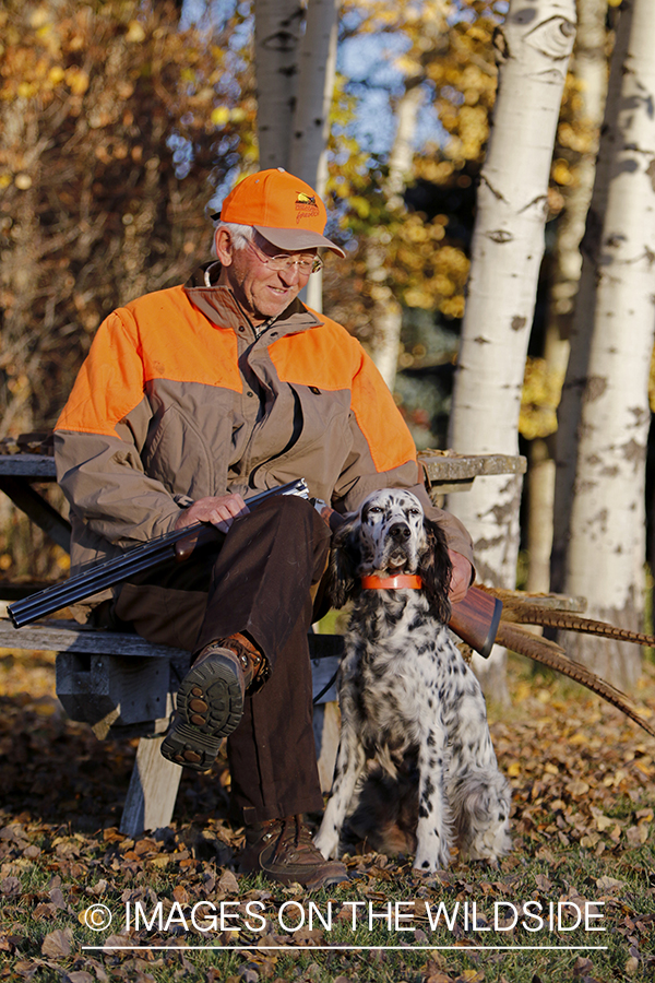 Hunter with English Setter in autumn.