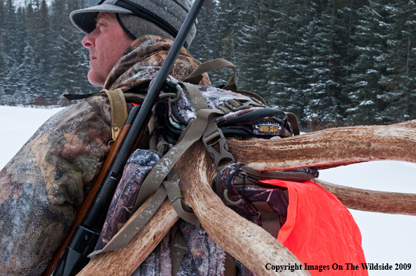 Hunter with elk rack