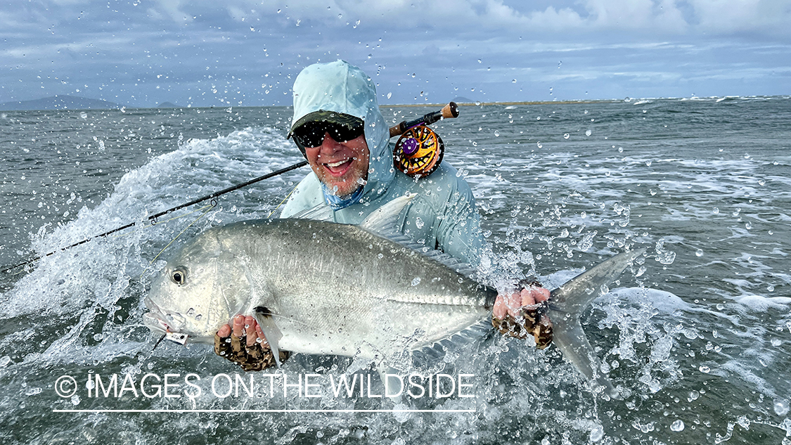 Flyfisherman with giant trevally.