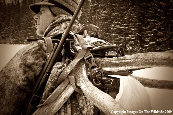 Hunter with elk rack