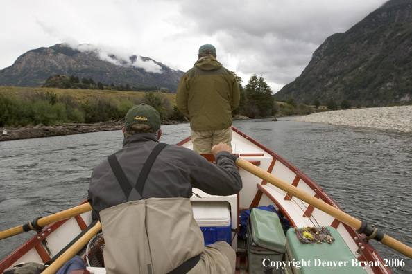 Flyfisherman casting from driftboat.