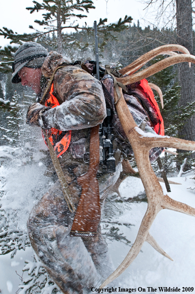 Hunter with elk rack