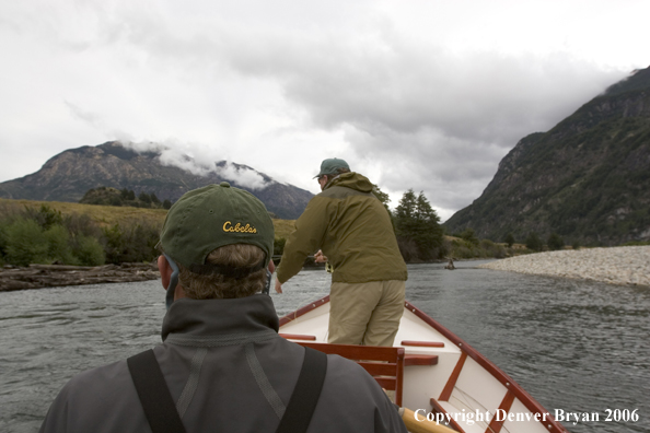 Flyfisherman casting from driftboat.