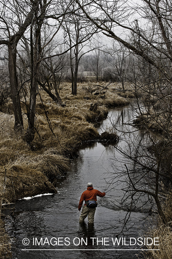 Flyfisherman on small stream.