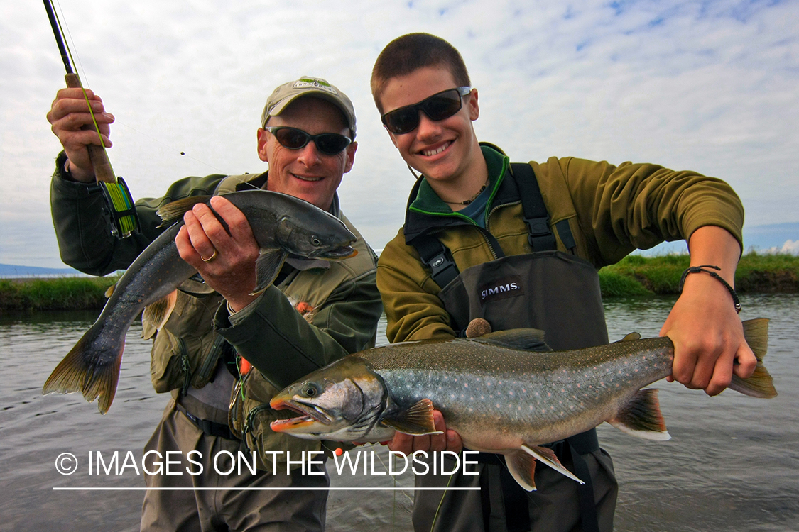 Flyfishermen with dolly varden catch.