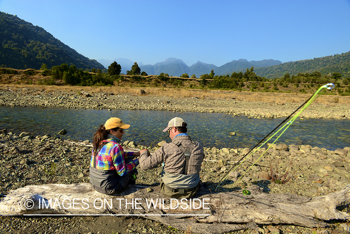 Flyfishermen on river in Chile.