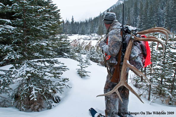 Hunter with elk rack