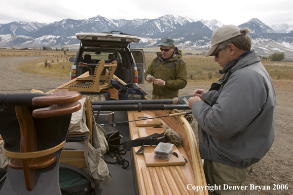 Flyfisherman getting ready for a day of fishing.