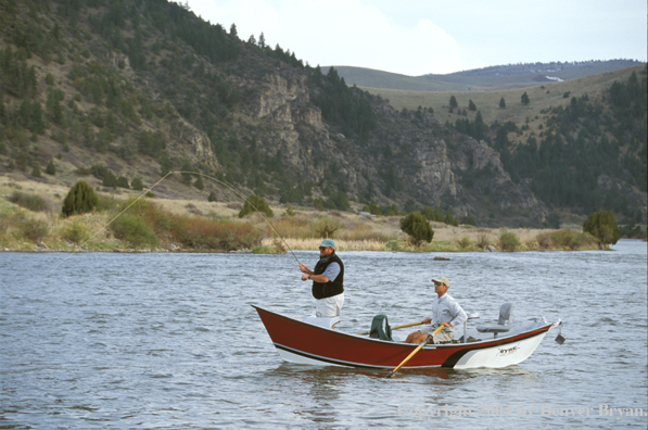 Flyfisherman fishing from driftboat.