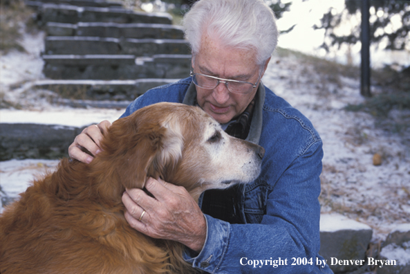 Man with golden Retriever