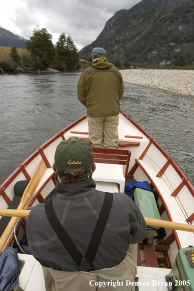 Flyfisherman casting from driftboat.