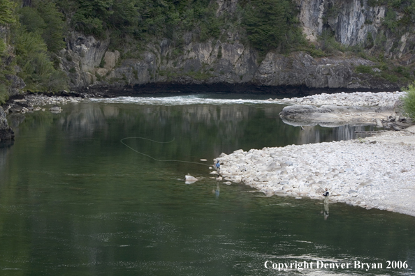 Flyfishermen casting from shore.