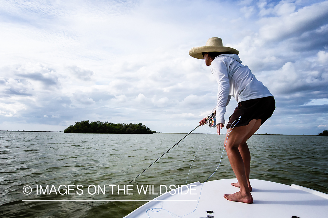 Flyfishing woman in flats.