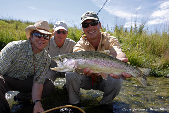 Flyfishermen with nice rainbow trout