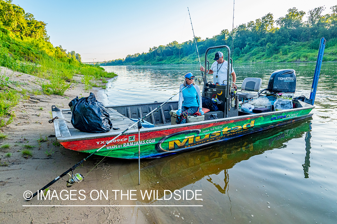 Flyfishermen on boat.