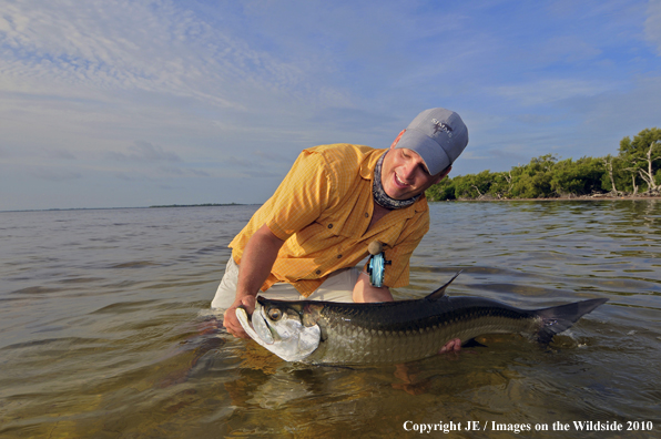 Saltwater Flyfisherman with nice Tarpon catch