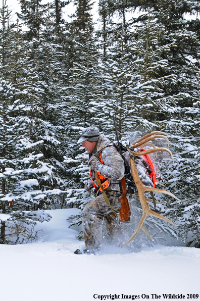 Hunter with elk rack