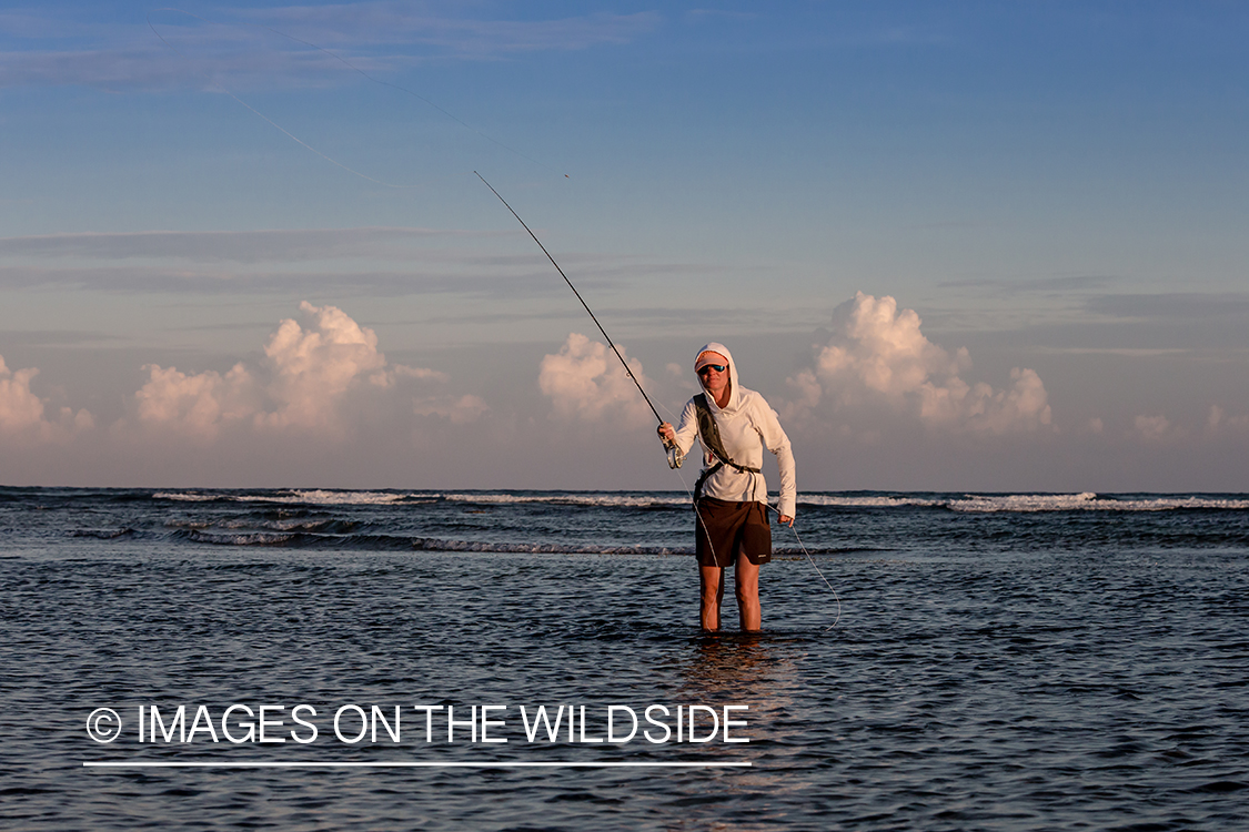 Flyfishing woman in flats.