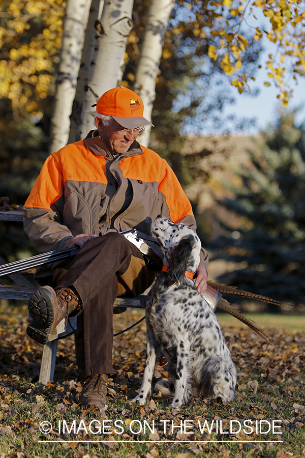 Hunter with English Setter in autumn.