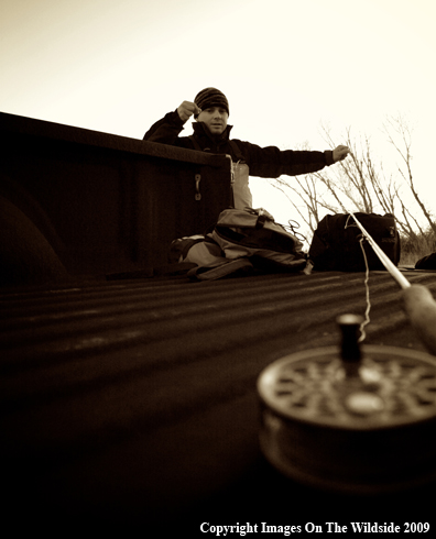 Flyfisherman Preparing Line