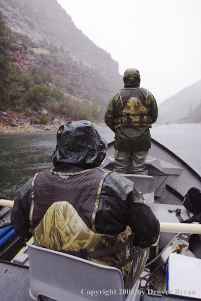 Flyfishermen fishing Green River from drift boat.