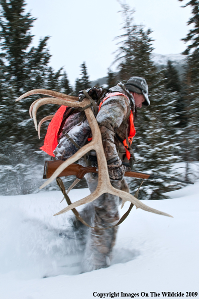 Hunter with elk rack