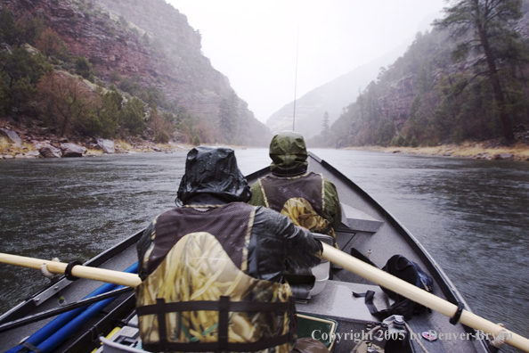 Flyfishermen fishing Green River from drift boat.