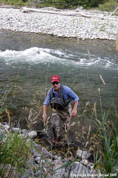 Drenched Flyfisherman after swim through rapids