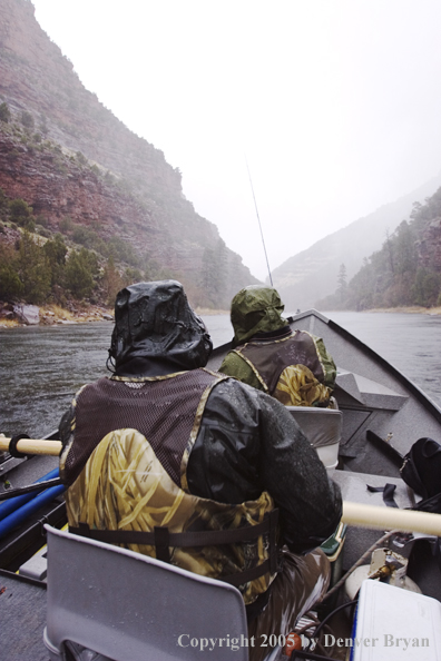 Flyfishermen fishing Green River from drift boat.