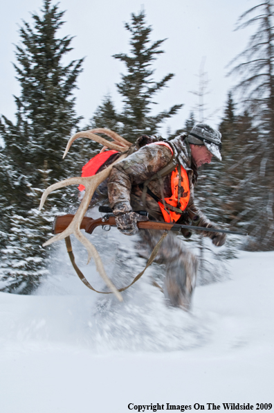 Hunter with elk rack