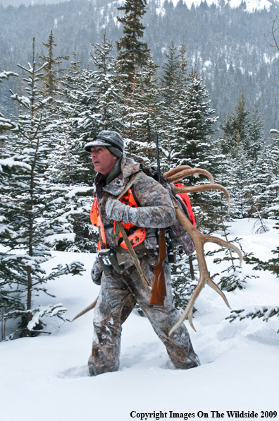 Hunter with elk rack