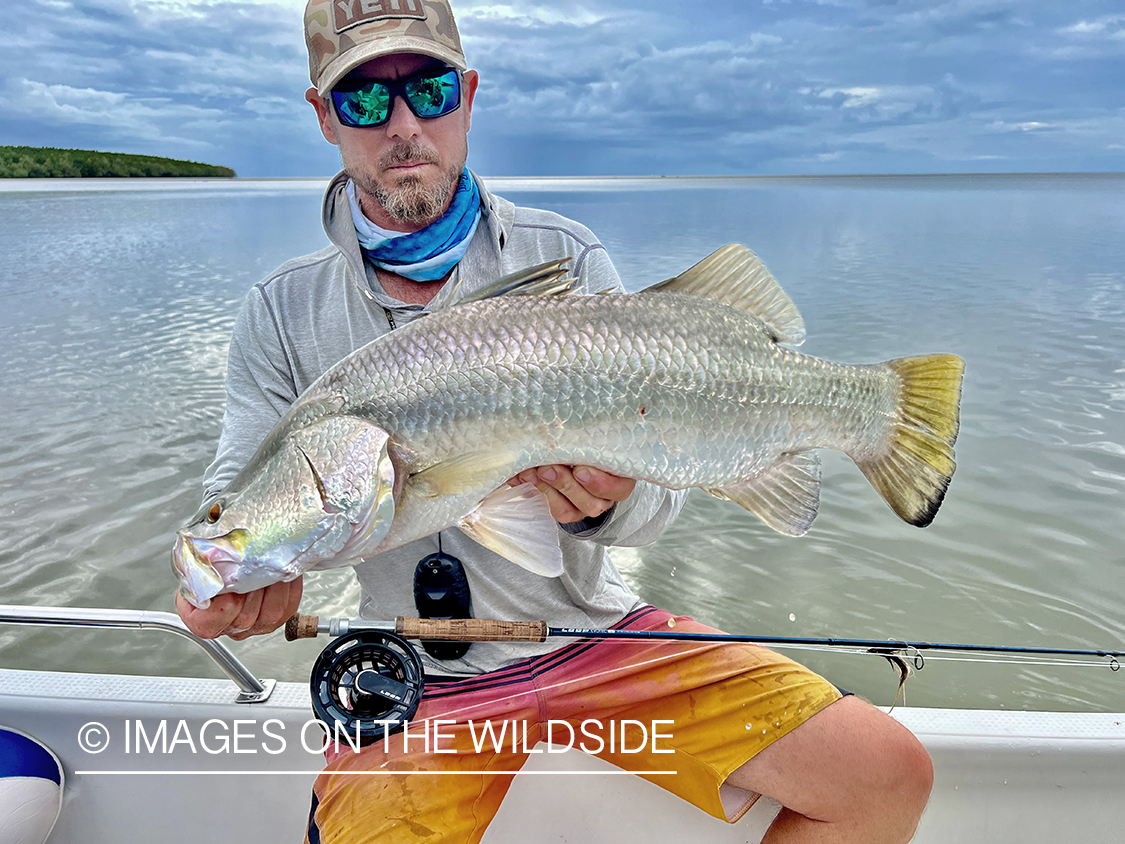 Flyfisherman with barramundi.