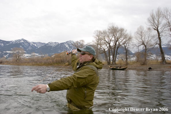 Flyfisherman in river.