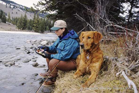 Female flyfisher selecting flies.