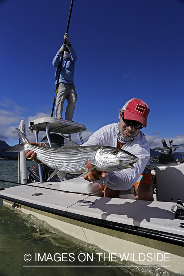 Saltwater flyfisherman with bonefish. 