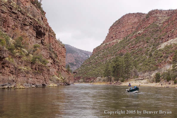 Flyfishermen fishing Green River from drift boat.