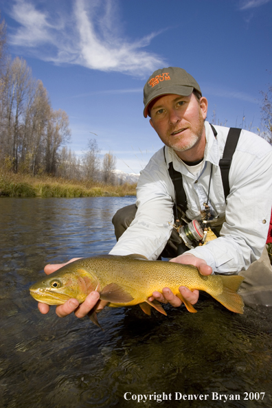 Flyfisherman with Snake River cutthroat trout.