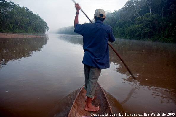 Local Bolivia native rowing canoe