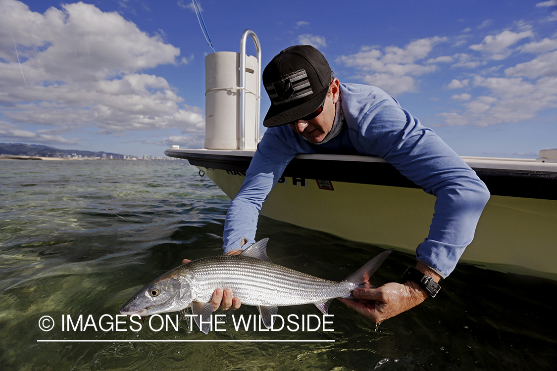 Saltwater flyfisherman with bonefish. 